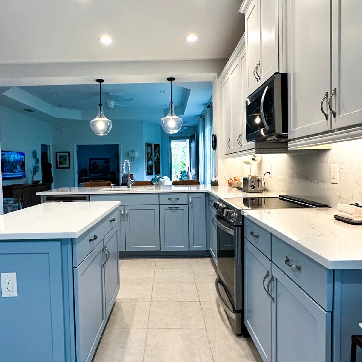 Open Kitchen With Two Tone Paint Upper White Lower Blue