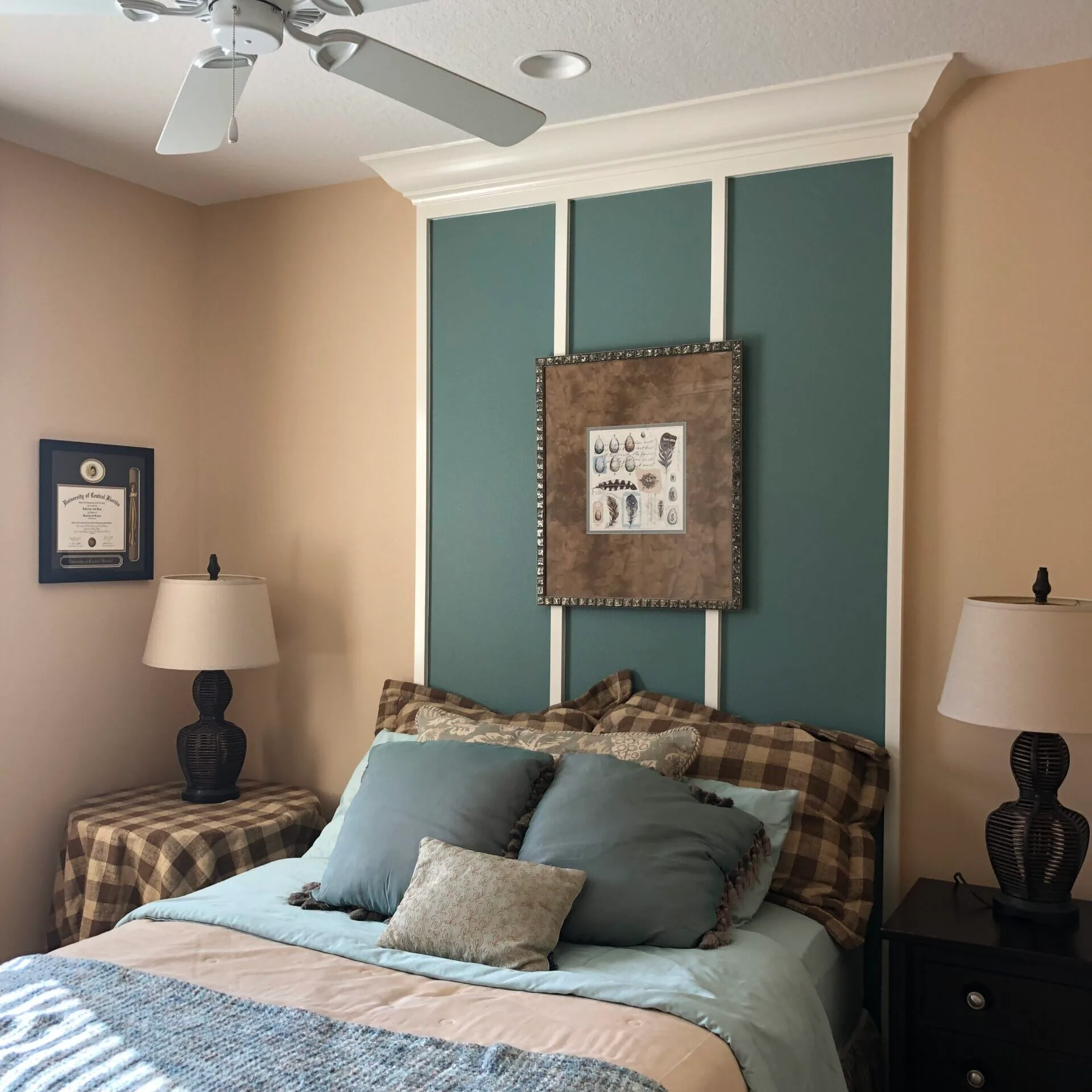 Bedroom with blue painted accent headboard-wall