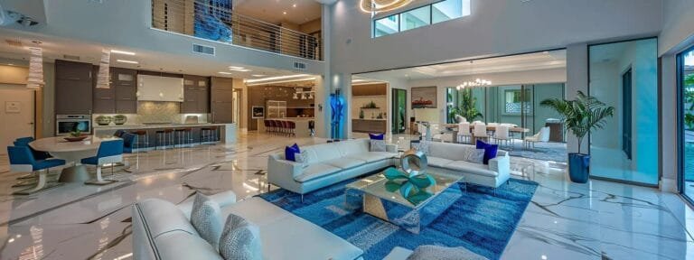 a chic interior of a modern florida home showcases the top paint color trends of 2025, featuring vibrant walls and elegant decor under soft, ambient lighting that highlights the aesthetic appeal of fresh interior designs.